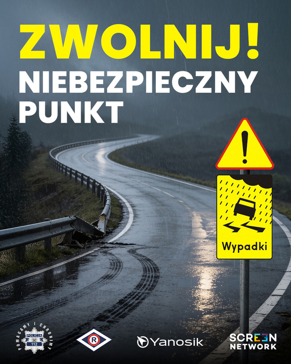droga z zakrętami nad nią widnieje napis zwolnij niebezpieczny punkt